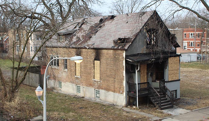 Boarded up house