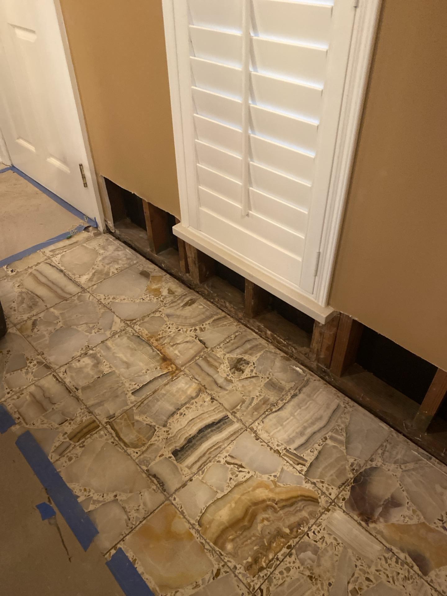 Controlled demolition to facilitate structural drying and water damage mitigation in Arlington, TX. Walls were opened to ensure complete dehumidification and prevent hidden mold growth after water extraction services.