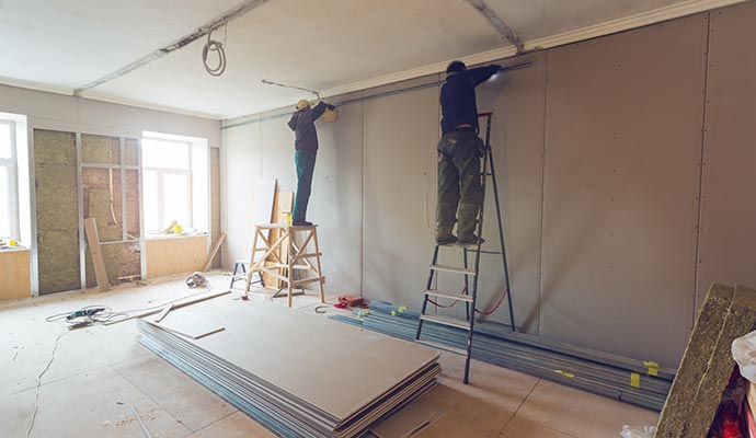 Two experts working together during a building reconstruction